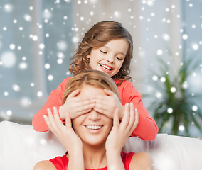 Image showing happy mother and daughter having fun at home