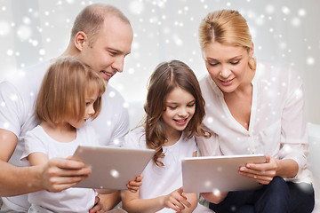 Image showing happy family with tablet pc computers