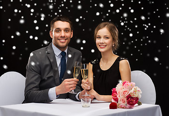 Image showing smiling couple at restaurant