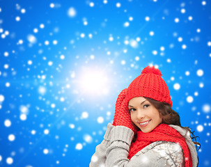 Image showing smiling young woman in winter clothes