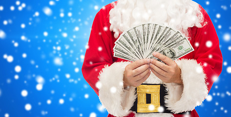 Image showing close up of santa claus with dollar money