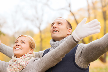 Image showing smiling couple in autumn park