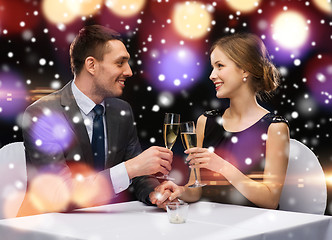 Image showing smiling couple at restaurant