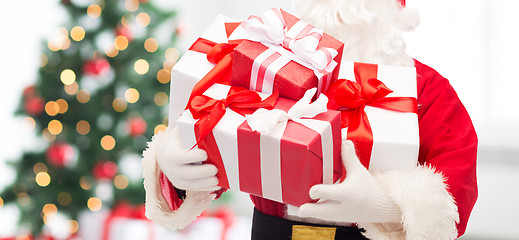 Image showing man in costume of santa claus with gift box