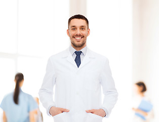 Image showing smiling male doctor in white coat