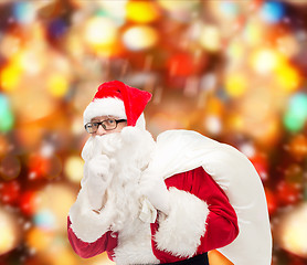 Image showing man in costume of santa claus with bag