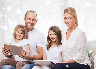 Image showing happy family with tablet pc computers