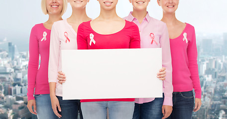 Image showing close up of women with cancer awareness ribbons