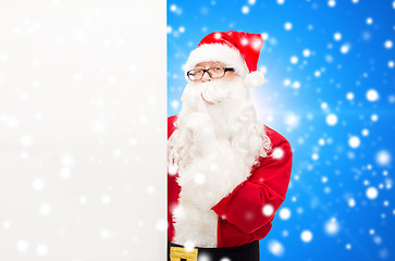 Image showing man in costume of santa claus with billboard