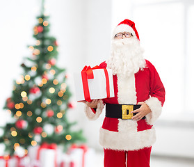 Image showing man in costume of santa claus with gift box