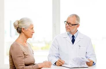 Image showing senior woman and doctor meeting