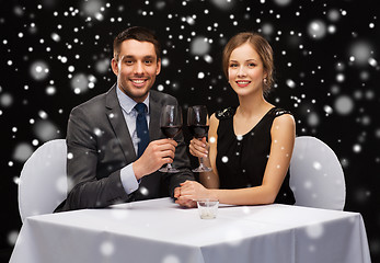 Image showing smiling couple at restaurant