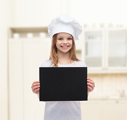 Image showing little cook or baker with blank black paper