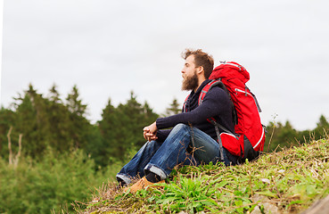 Image showing man with backpack hiking