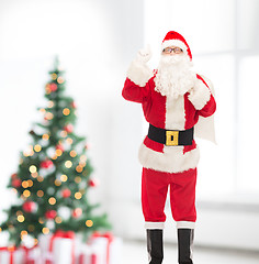 Image showing man in costume of santa claus with bag