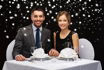 Image showing smiling couple at restaurant