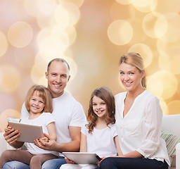 Image showing happy family with tablet pc computers