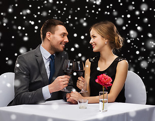 Image showing smiling couple at restaurant