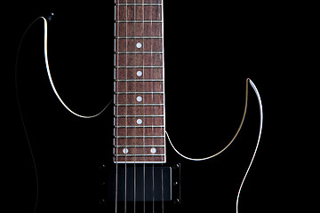 Image showing electric guitar silhouette isolated on black