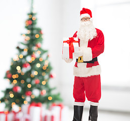 Image showing man in costume of santa claus with gift box