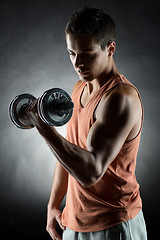 Image showing young man with dumbbell