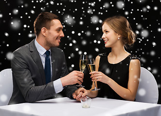 Image showing smiling couple at restaurant