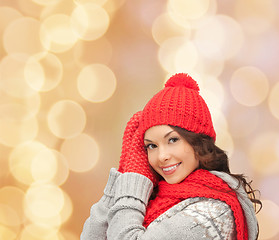 Image showing smiling young woman in winter clothes