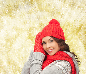 Image showing smiling young woman in winter clothes