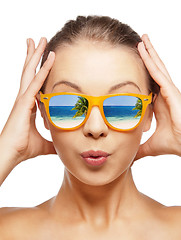 Image showing amazed teenage girl in sunglasses