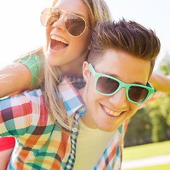 Image showing smiling couple having fun in park