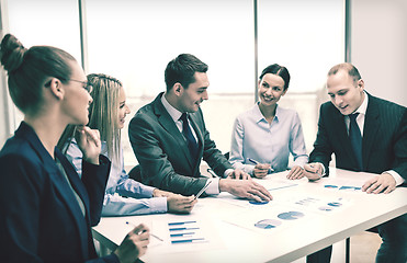 Image showing smiling business team at meeting