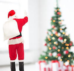 Image showing man in costume of santa claus with bag