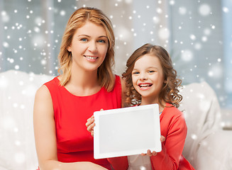 Image showing mother and daughter with tablet pc at home