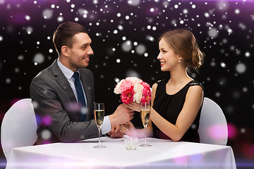 Image showing smiling couple course at restaurant