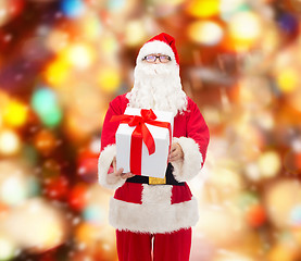 Image showing man in costume of santa claus with gift box