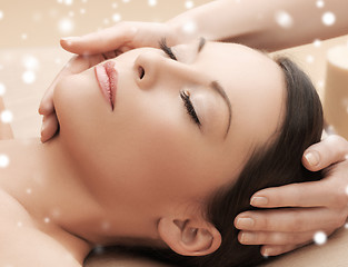 Image showing beautiful woman getting face or head massage