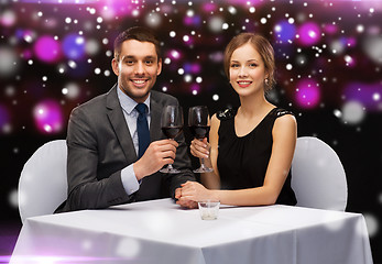 Image showing smiling couple at restaurant