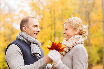 Image showing smiling couple in autumn park
