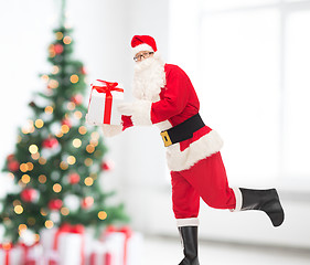 Image showing man in costume of santa claus with gift box