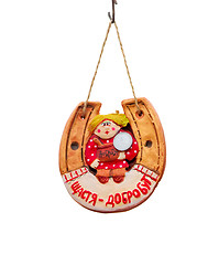 Image showing Souvenir with wishes of happiness and wealth.