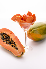 Image showing Tangerine pulp and peppery seeds - the Papaya
