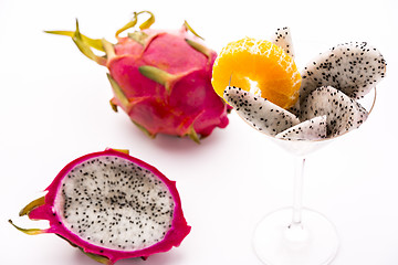 Image showing Vibrant purple fruit with white pulp - Pitaya
