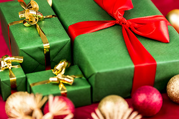 Image showing Four Xmas Presents in Plain Green