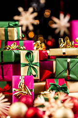 Image showing Single-Colored Xmas Gifts Stacked Up