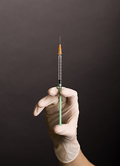 Image showing Flicking syringe