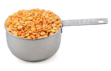 Image showing Yellow split peas in a cup measure