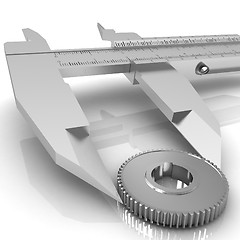 Image showing Vernier caliper measures the cogwheel 