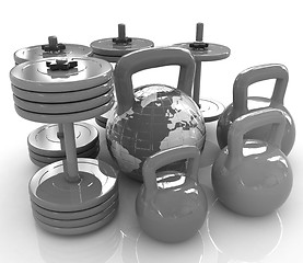 Image showing Colorful weights and dumbbells and earth. Global 