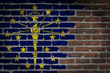 Image showing Brick wall texture with flag