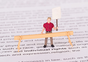 Image showing Tiny person demonstrating for his rights 